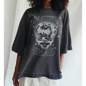 NEW PEOPLE OF LEISURE grateful dead shakedown street oversized tee in vintage bl
